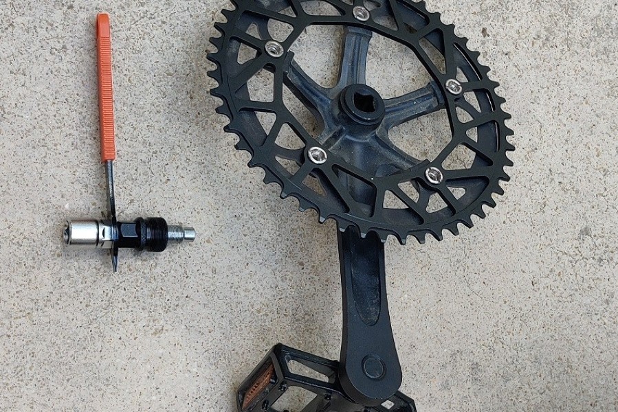 Replace your old chainring with the new larger ring